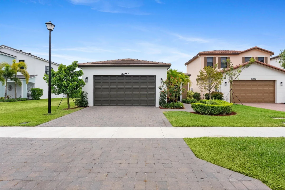 16390 Sea Turtle Pl, The Acreage: photo 1 of 52