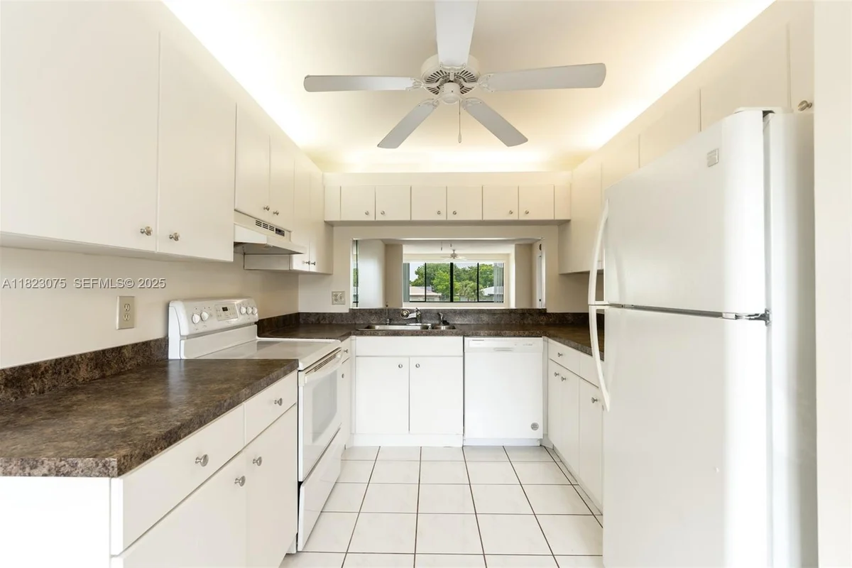 9455 N Belfort Cir #211, Tamarac: photo 1 of 26