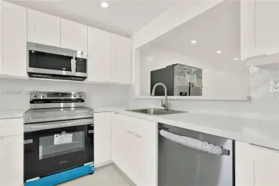 8320 Sands Point Blvd #M107, Tamarac: photo 1 of 31