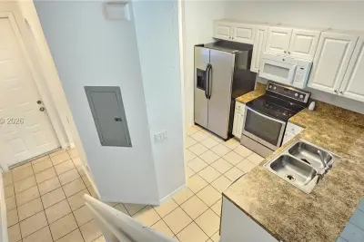 1935 Gardenia Ct, Riviera Beach: photo 1 of 49