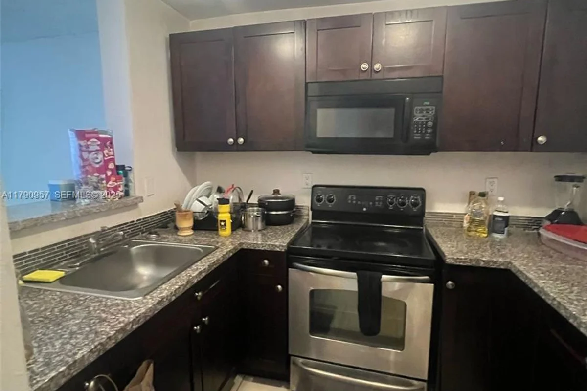 482 NW 165th St Rd #A203, Miami: photo 1 of 6