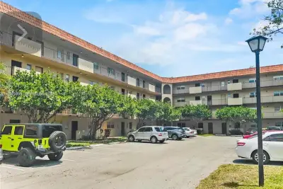 Condo in Lauderhill: photo 1 of 36