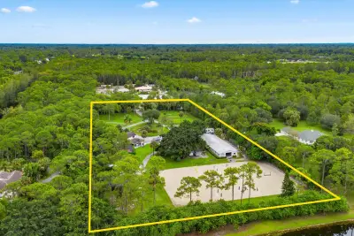 2915 Doe Trl, The Acreage: photo 1 of 31