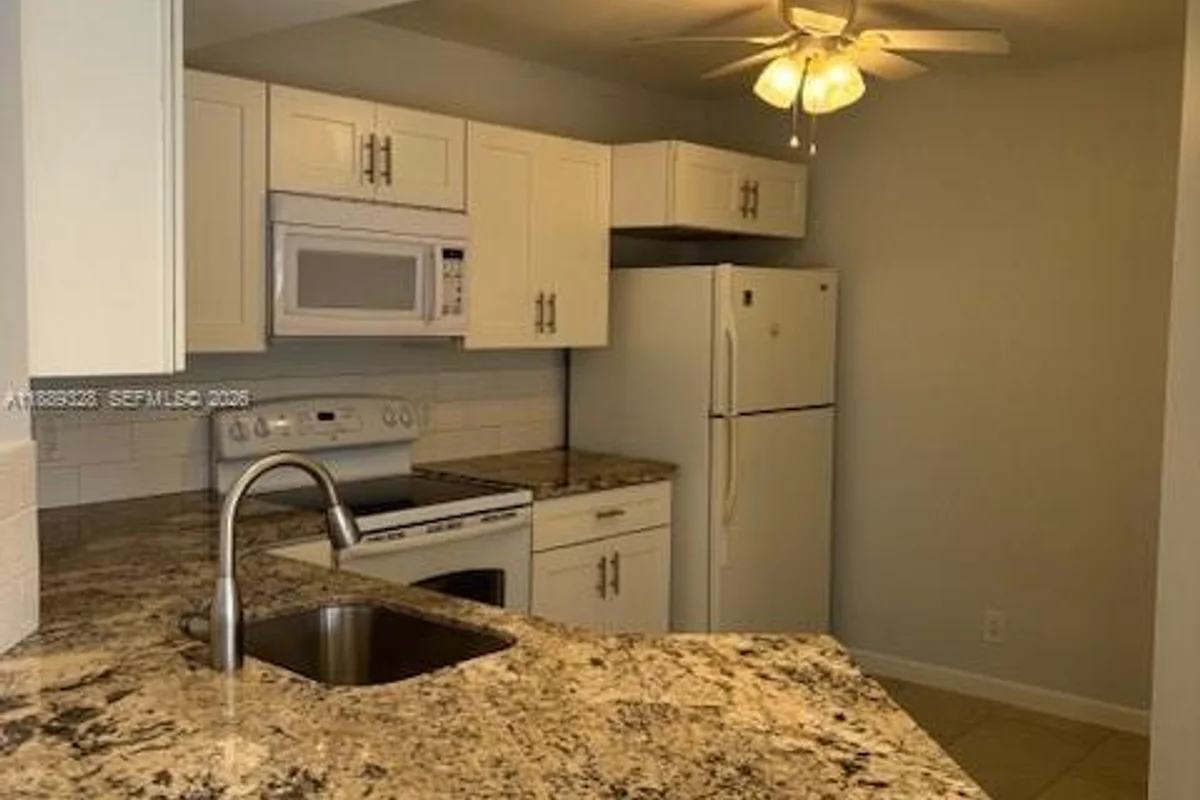 8977 Wiles Rd #103, Coral Springs: photo 1 of 11