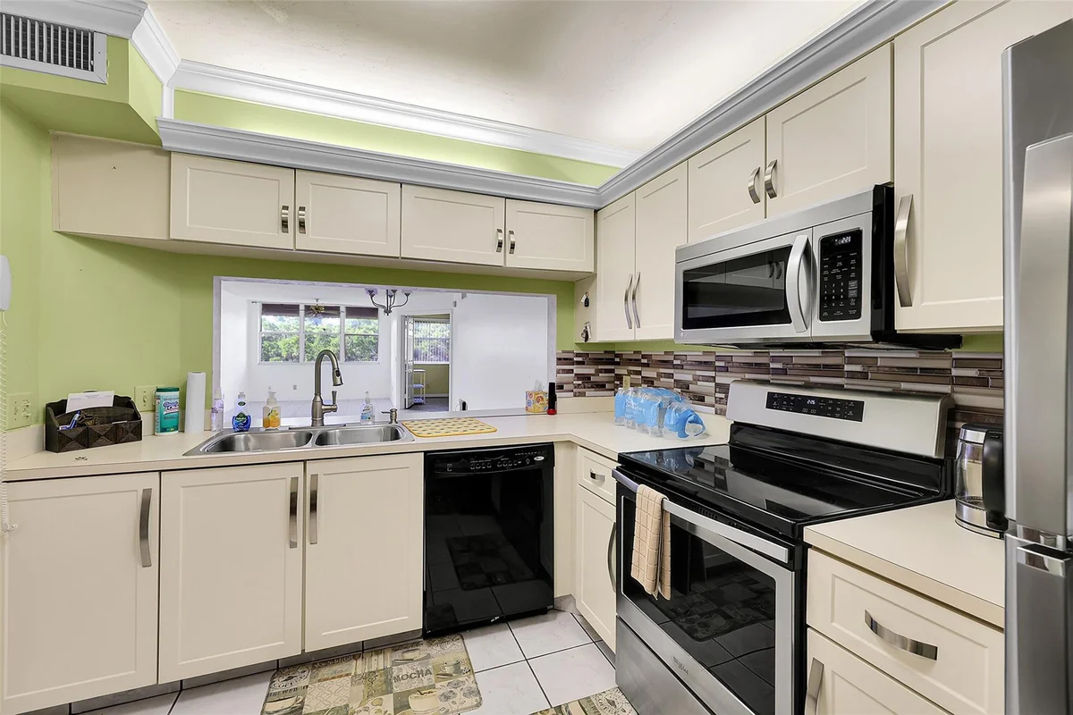 10369 NW 24th Pl #402, Sunrise: photo 1 of 43