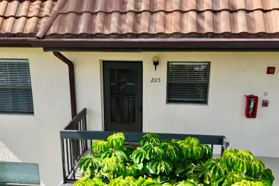 7214 Golf Colony Ct #205, Lake Worth: photo 1 of 46