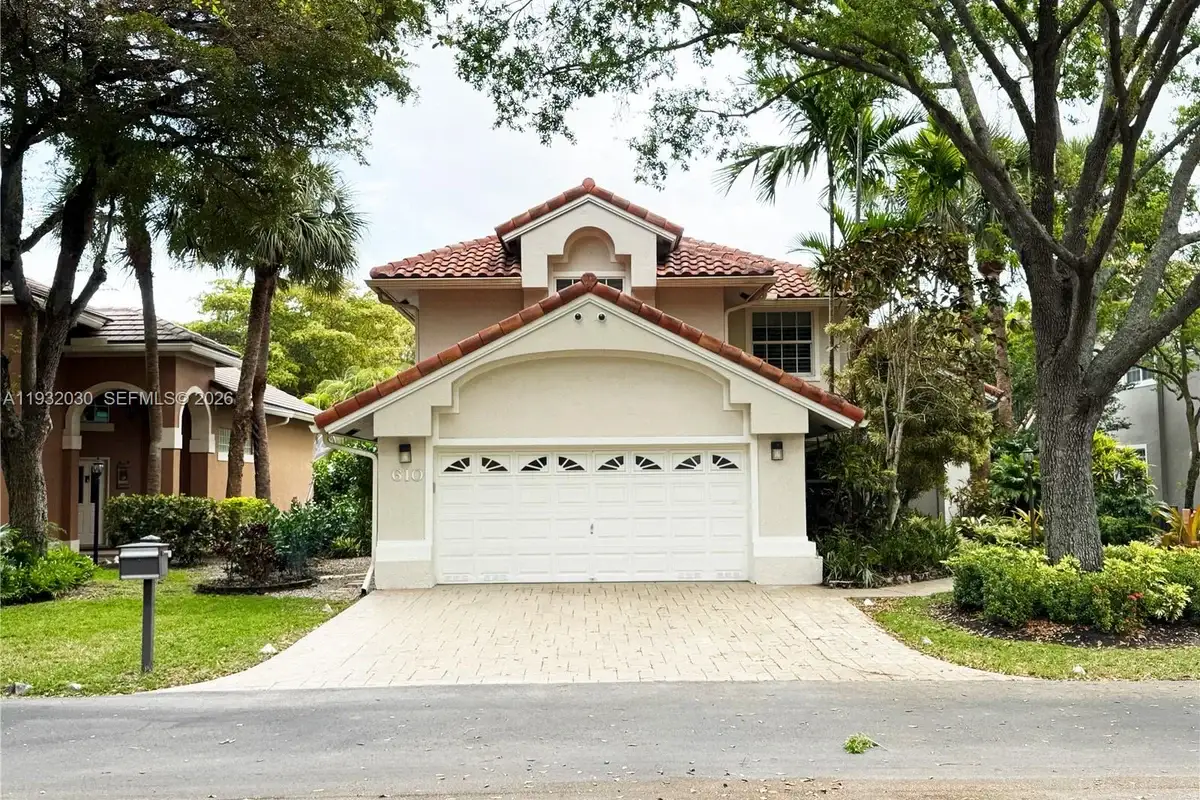 610 Misty Oaks Ln, Pompano Beach: photo 1 of 57