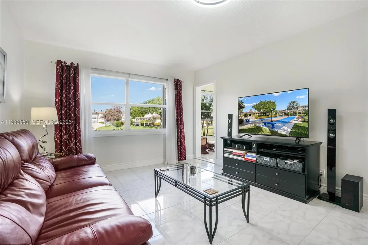 4801 NW 34th St #406, Lauderdale Lakes: photo 1 of 35