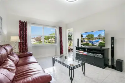 4801 NW 34th St #406, Lauderdale Lakes: photo 1 of 35
