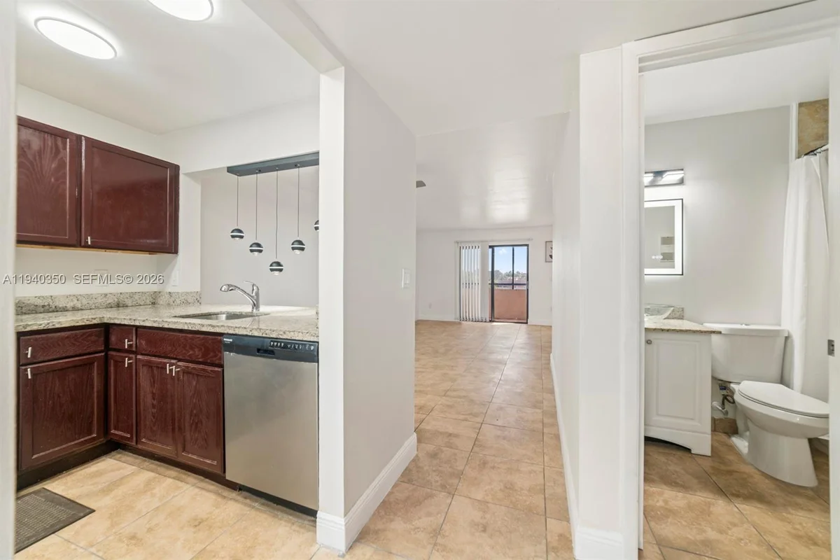 880 NE 207th Ter #202-10, Miami: photo 1 of 15