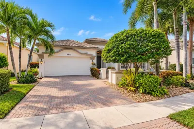 9842 Via Elegante, Wellington: photo 1 of 55