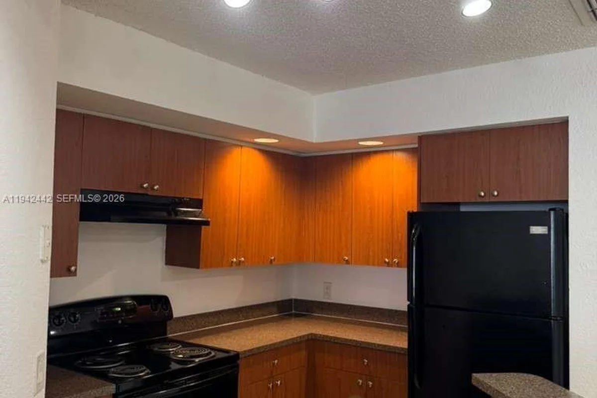 Condo in Margate: photo 1 of 15
