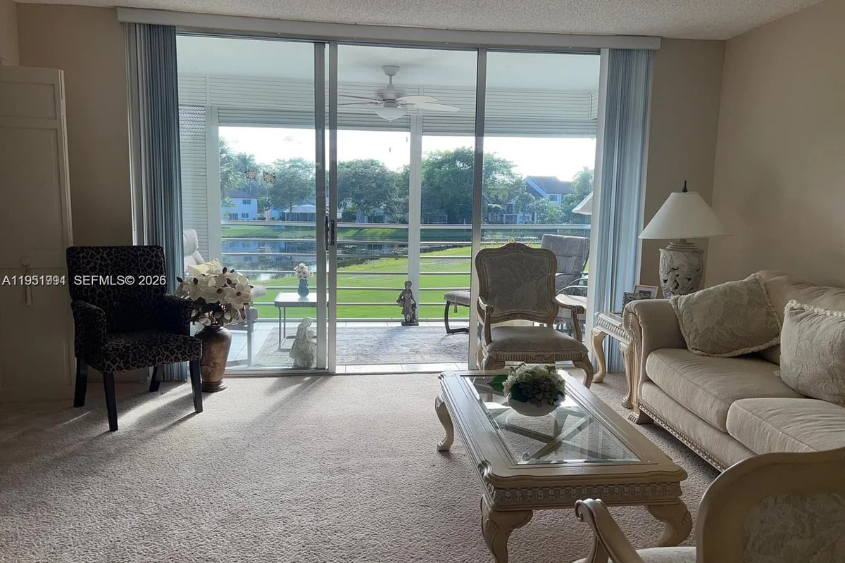 821 Cypress Blvd #312, Pompano Beach: photo 1 of 52