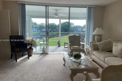 821 Cypress Blvd #312, Pompano Beach: photo 1 of 52
