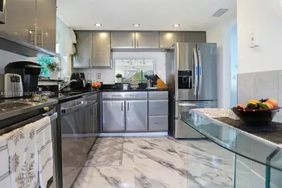 6570 Royal Palm Blvd #301J, Margate: photo 1 of 35