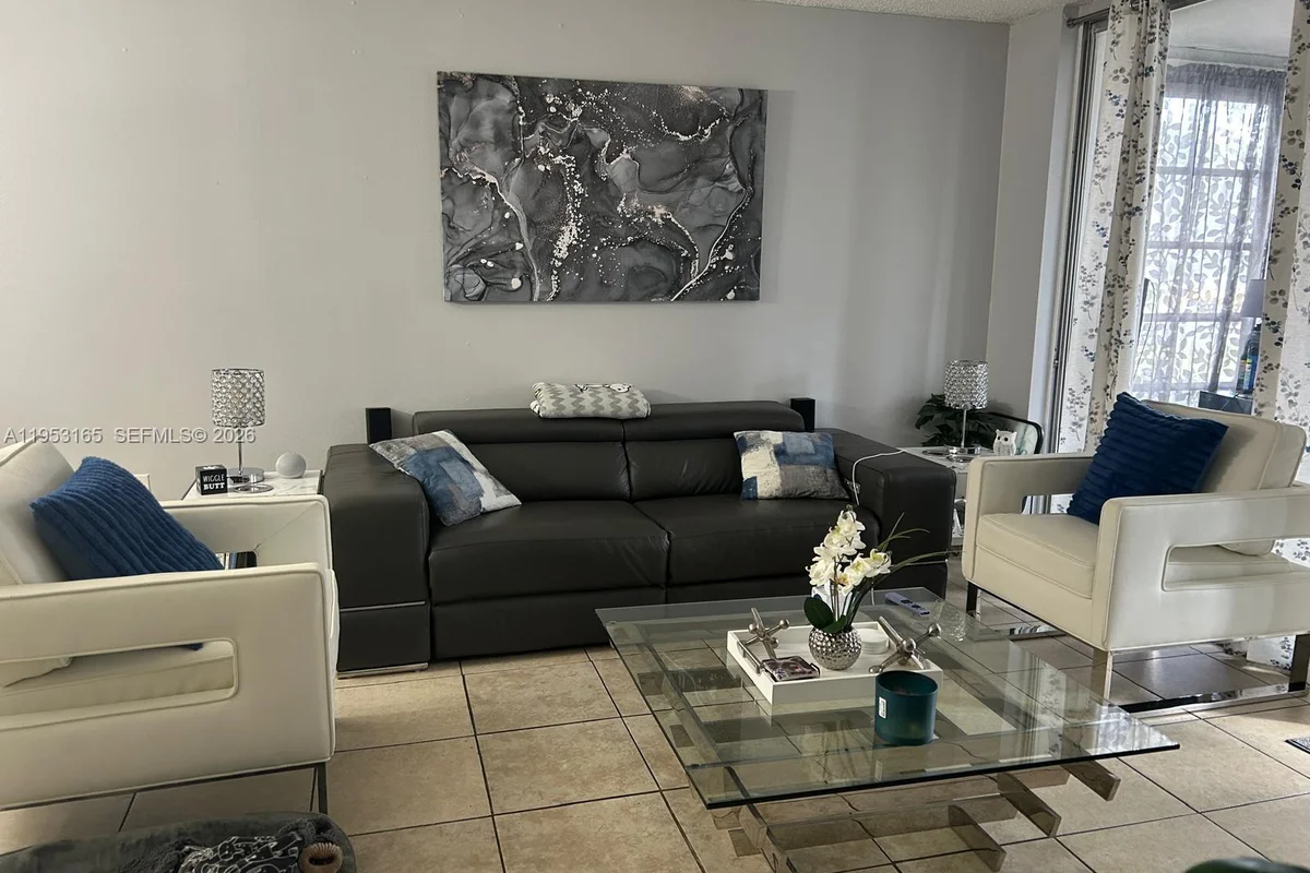 8350 Sands Point Blvd #E101, Tamarac: photo 1 of 26