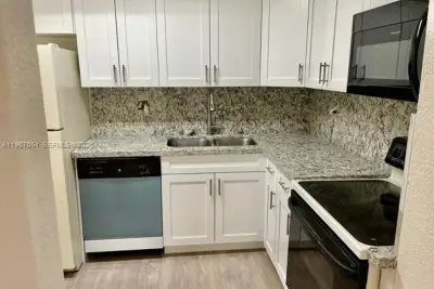 1754 NW 55th Ave #102, Lauderhill: photo 1 of 11