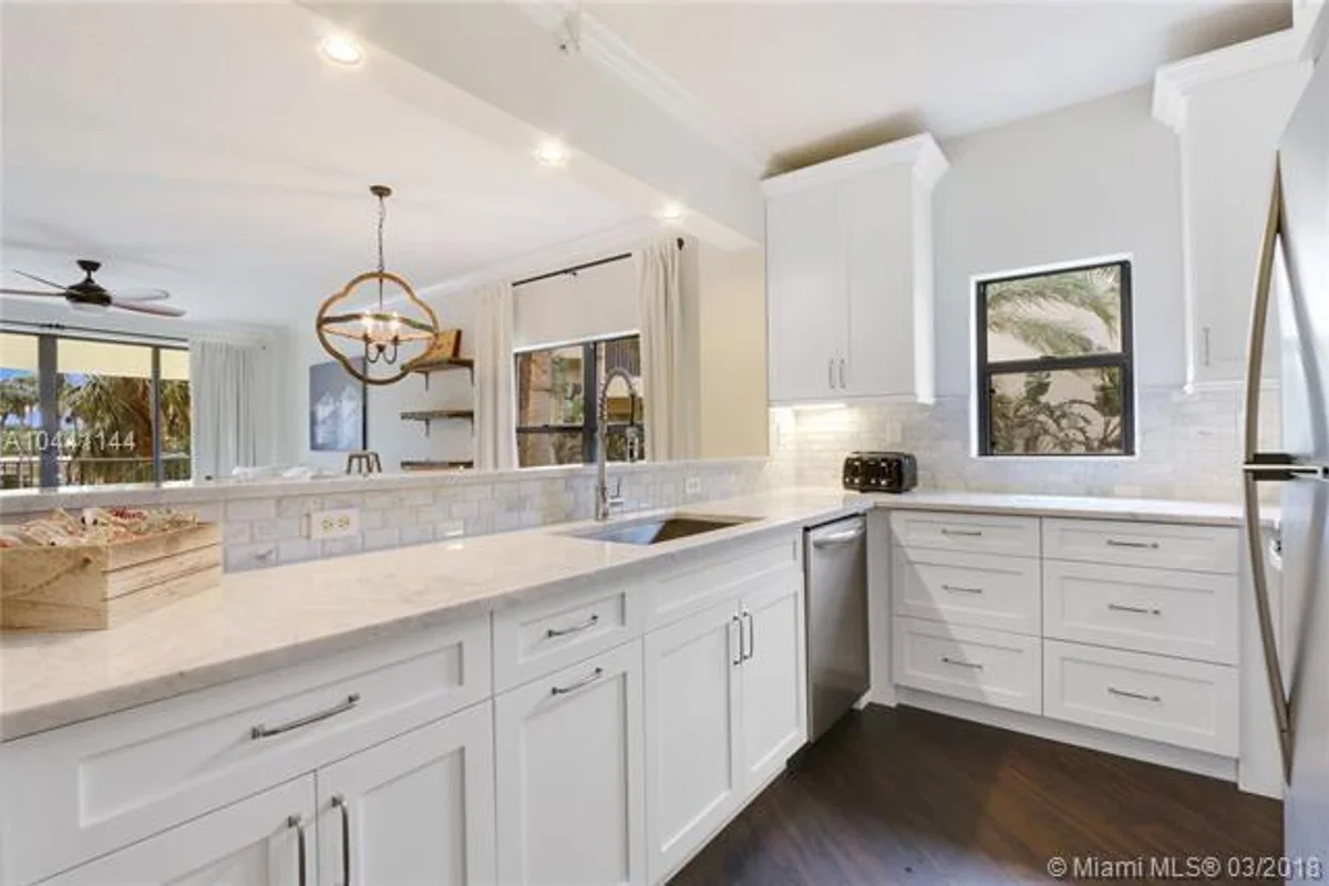 100 Uno Lago Dr #205, Juno Beach: photo 1 of 13