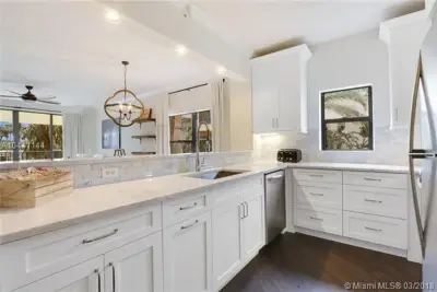 100 Uno Lago Dr #205, Juno Beach: photo 1 of 13