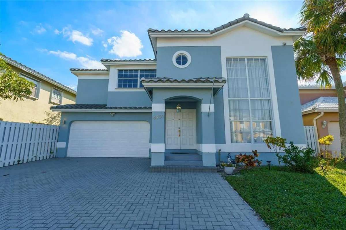 4450 NW 55th Dr, Coconut Creek: photo 1 of 52