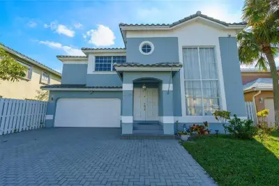 4450 NW 55th Dr, Coconut Creek: photo 1 of 52