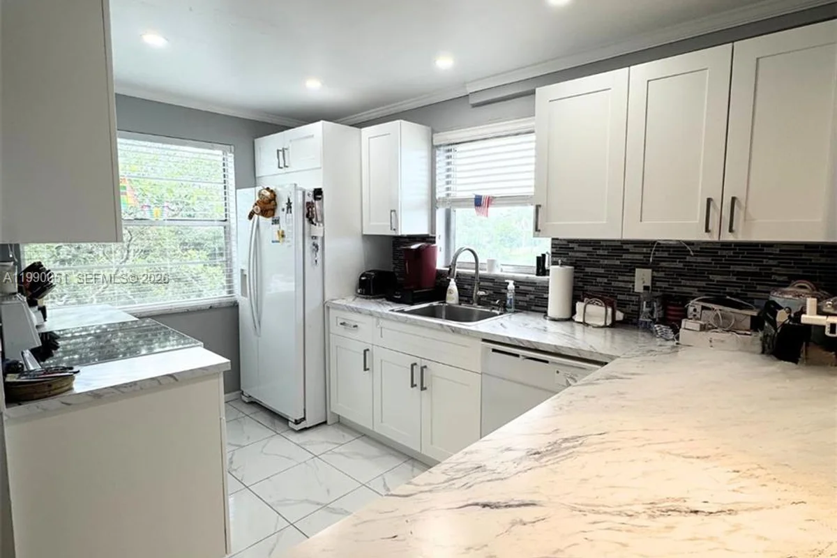 3776 Inverrary Blvd #301R, Lauderhill: photo 1 of 37