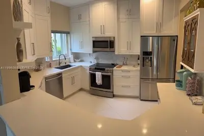 5656 NW 127th Ter, Parkland: photo 1 of 14