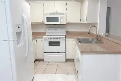 9491 S Palm Cir S #103, Pembroke Pines: photo 1 of 19