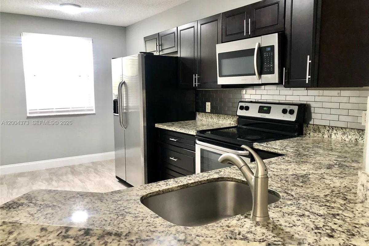 8761 Wiles Rd #306, Coral Springs: photo 1 of 24