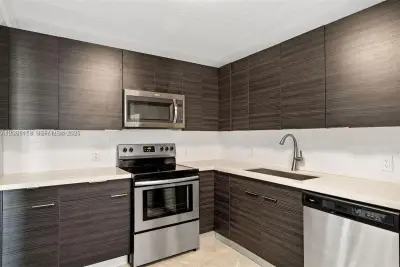 390 Racquet Club Rd #202, Weston: photo 1 of 12