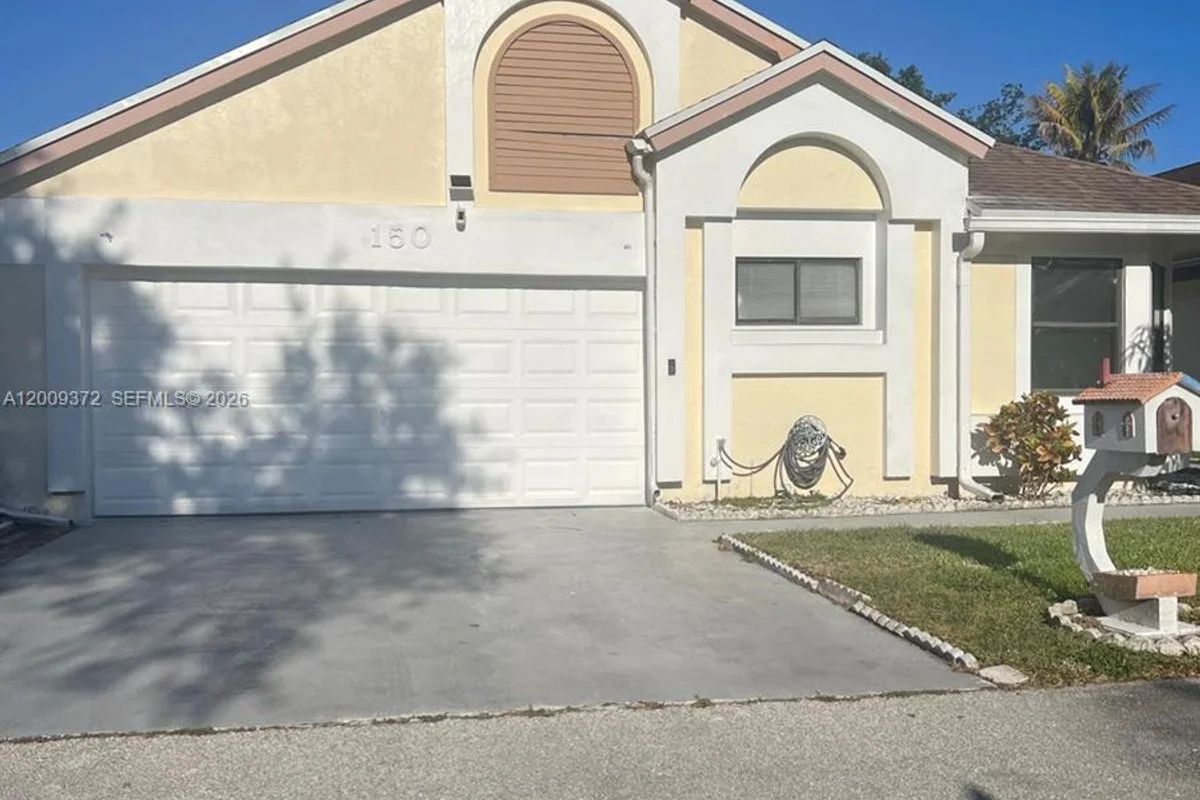 150 Colly Way, North Lauderdale: photo 1 of 13