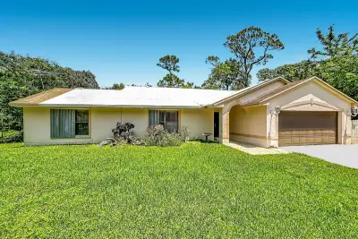 12821 N 86th Rd N, The Acreage: photo 1 of 58