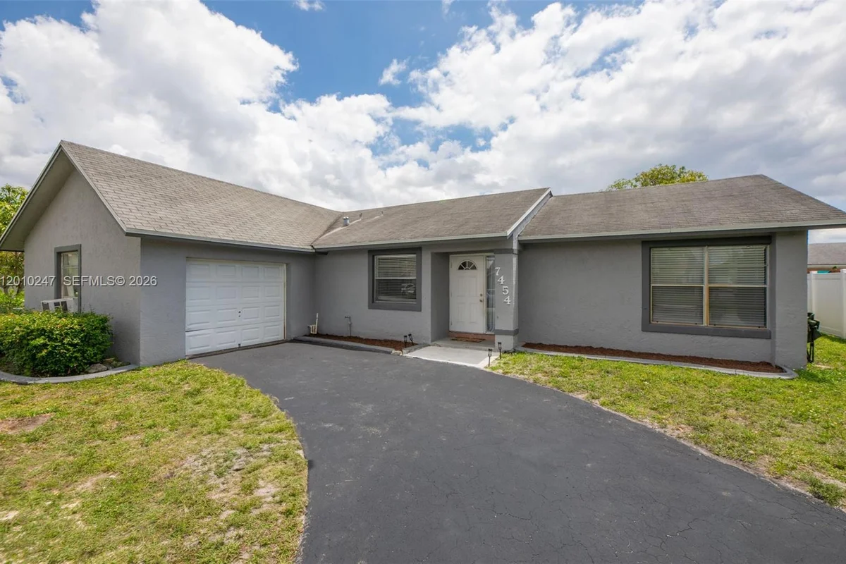 7454 NW 48th Pl, Lauderhill: photo 1 of 45