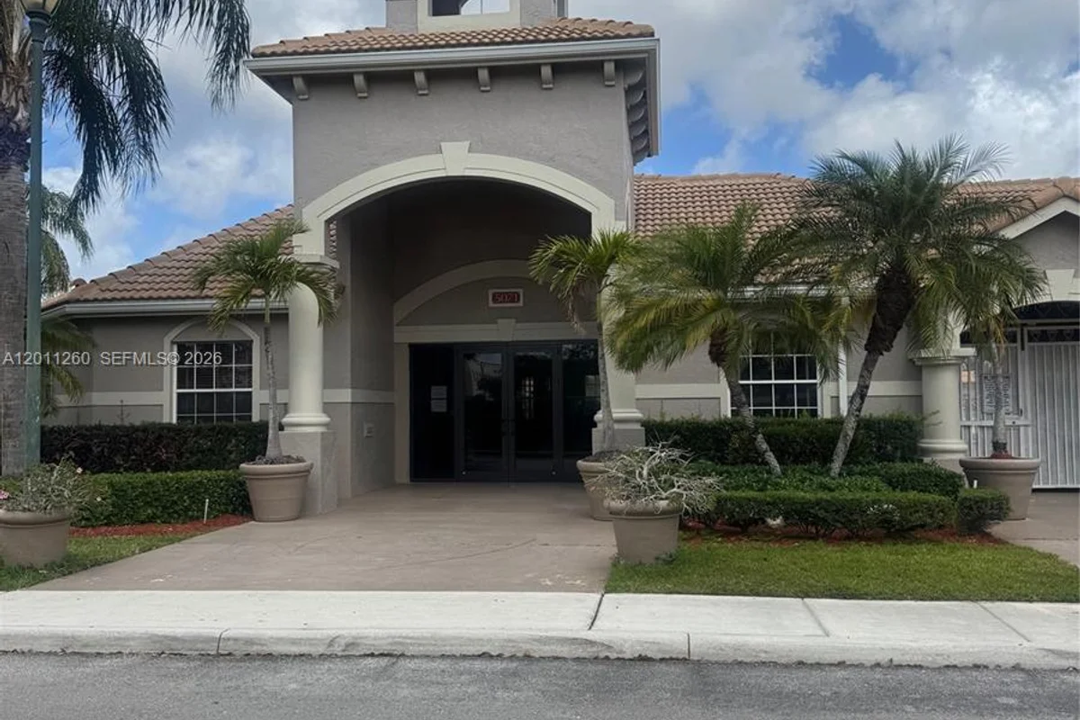 5065 Wiles Rd #103, Coconut Creek: photo 1 of 47