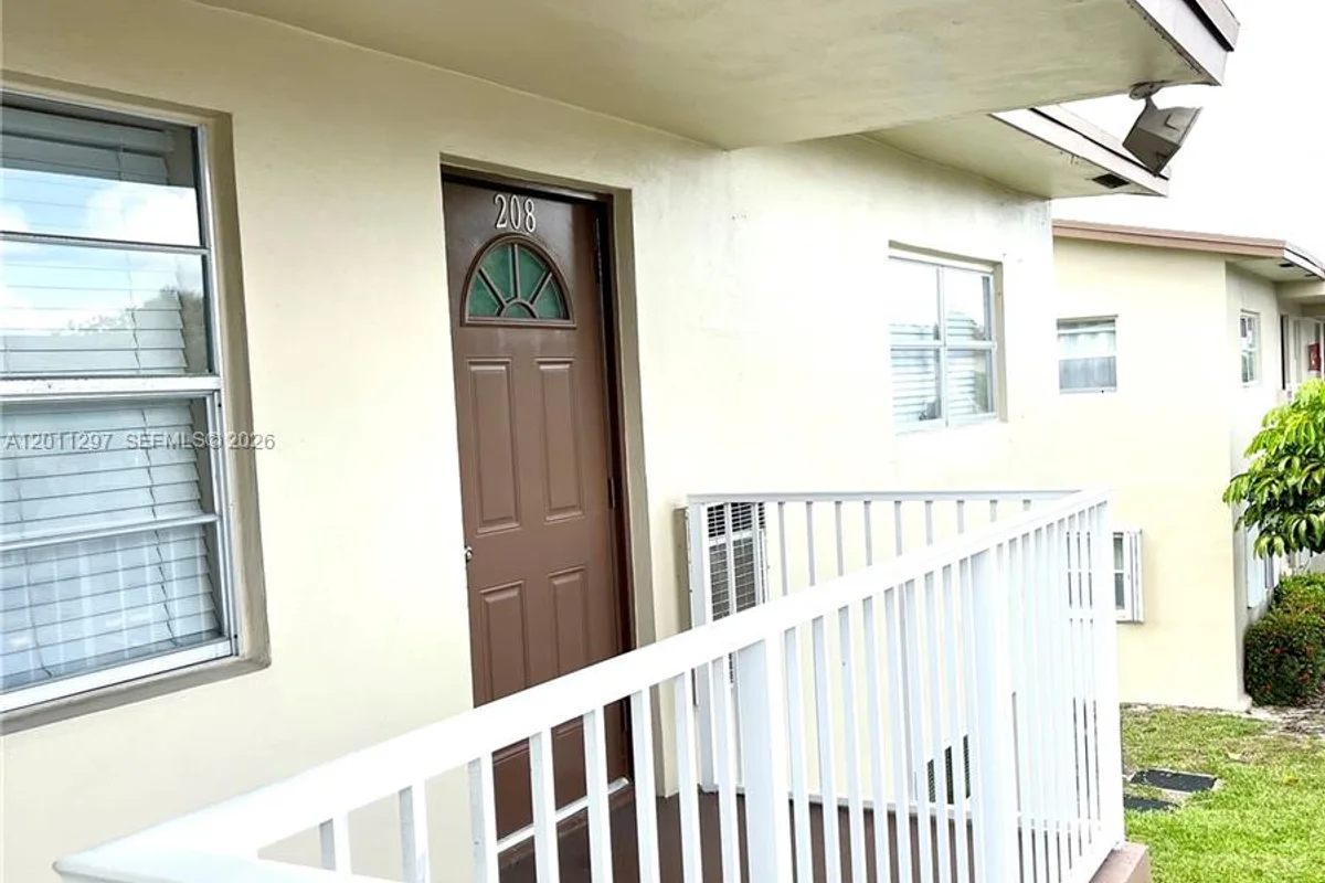 551 NW 80th Ter #208, Margate: photo 1 of 32