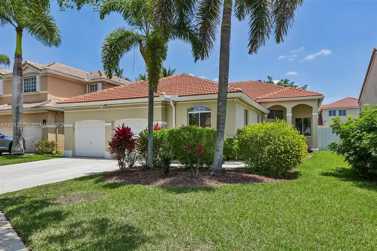 1290 Camellia Ln, Weston: photo 1 of 50