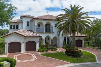 7290 Lemon Grass Dr, Parkland: photo 1 of 80