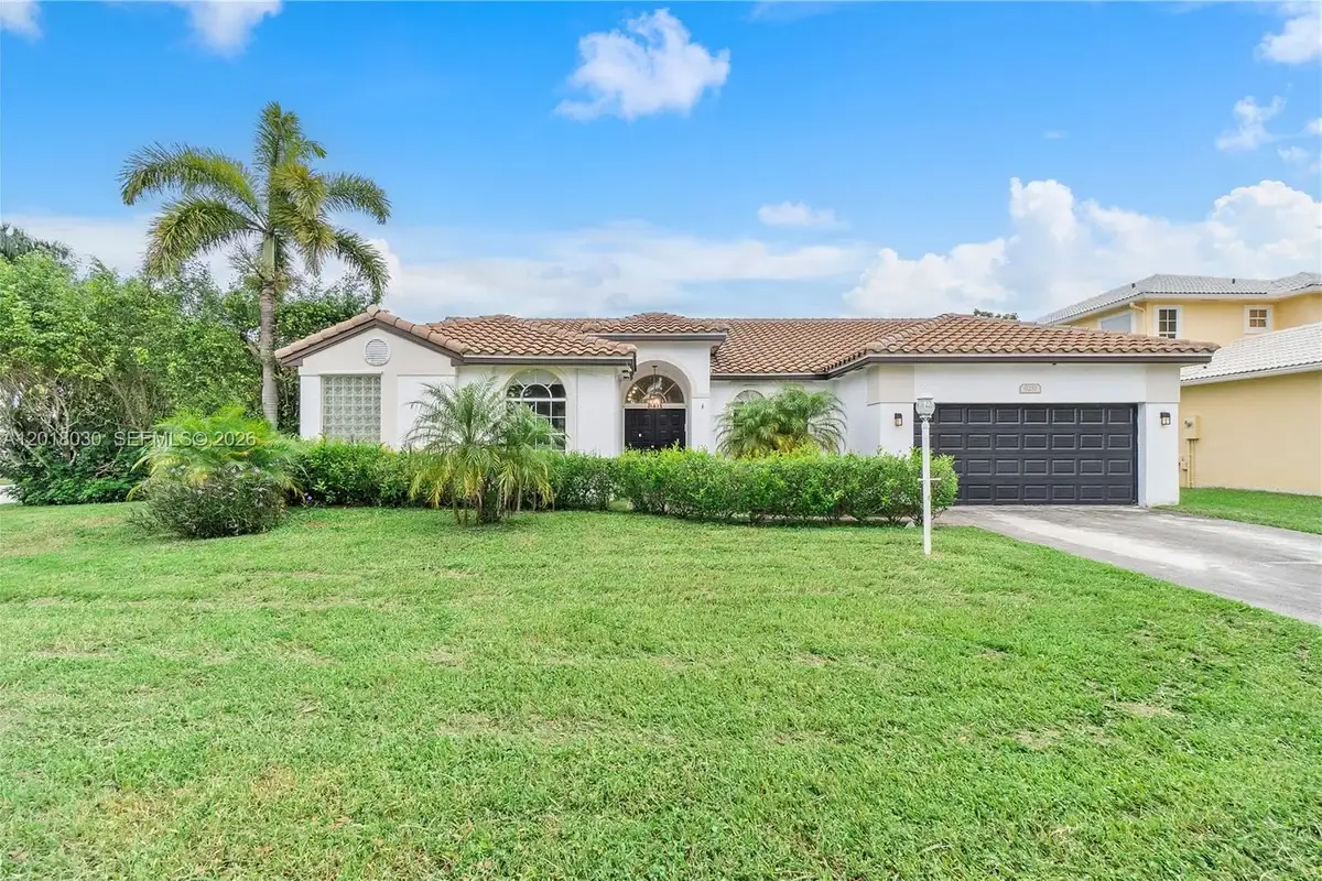 9251 NW 42nd Ct, Coral Springs: photo 1 of 49