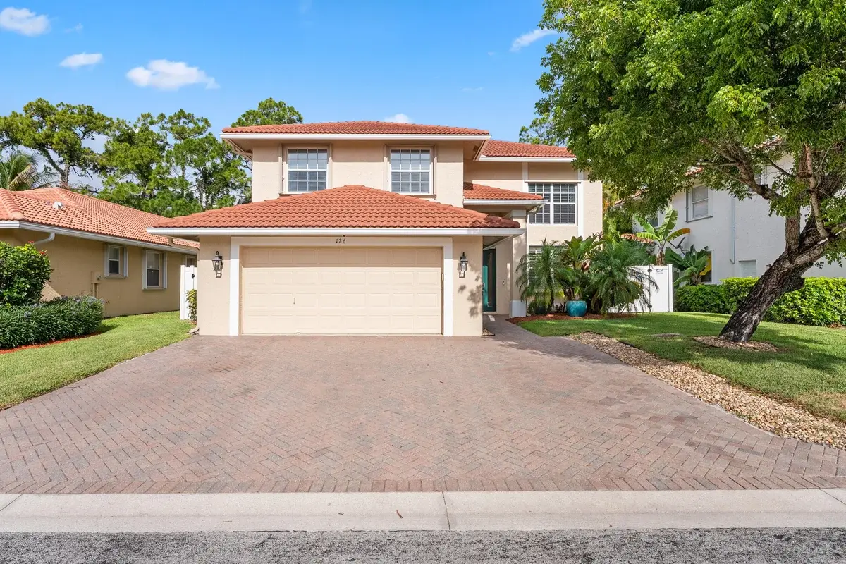 126 Hidden Hollow Dr, Palm Beach Gardens: photo 1 of 57