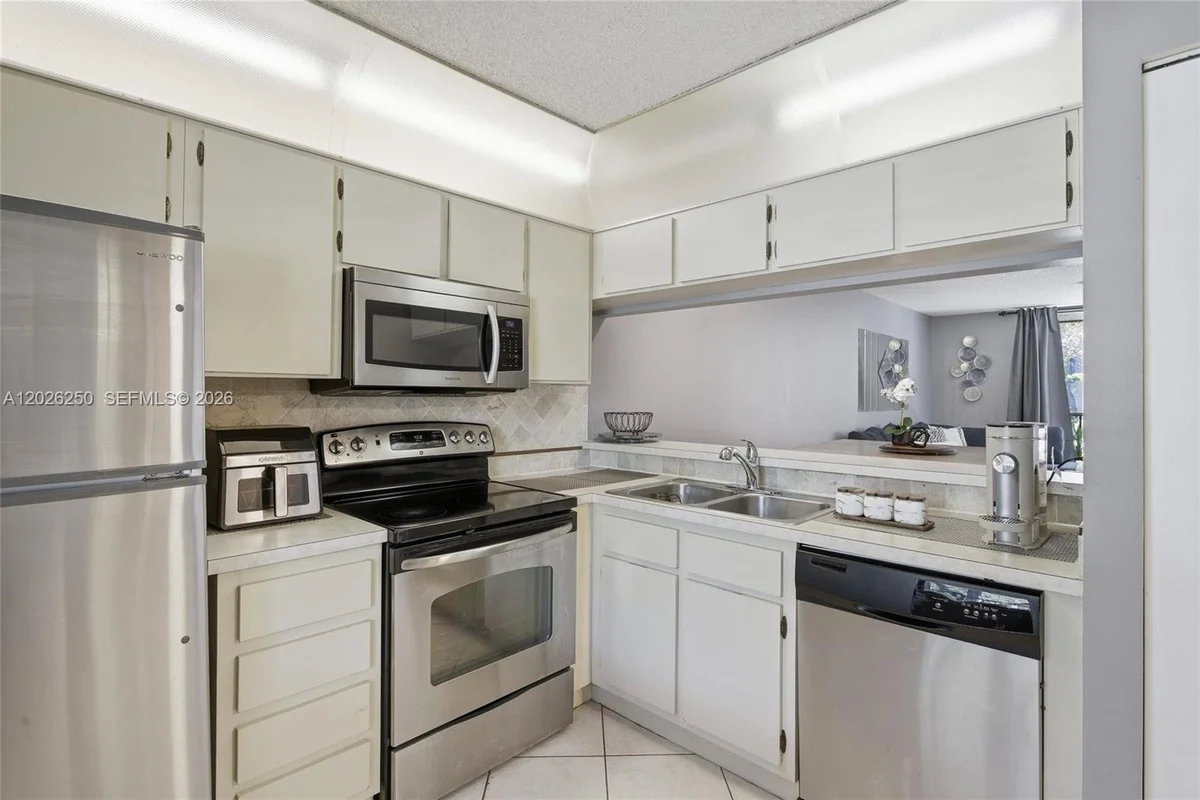 10451 W Broward Blvd #209, Plantation: photo 1 of 44