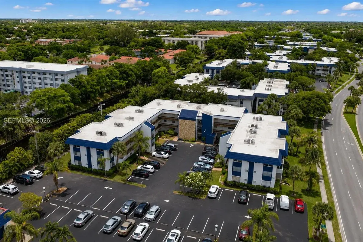 3050 Holiday Springs Blvd #305, Margate: photo 1 of 19