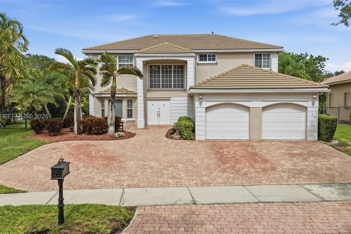2608 Oakbrook Ct, Weston: photo 1 of 40