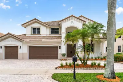 2432 Deer Creek Rd, Weston: photo 1 of 48
