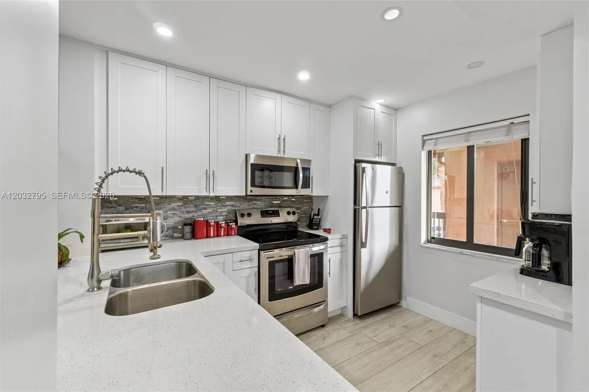 10003 Winding Lake Rd #203, Sunrise: photo 1 of 21