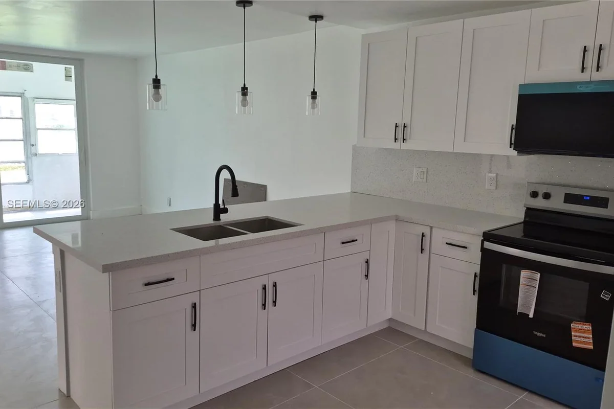 6050 NW 64th Ave #105, Tamarac: photo 1 of 18