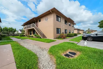 10049 Winding Lake Rd #202, Sunrise: photo 1 of 23