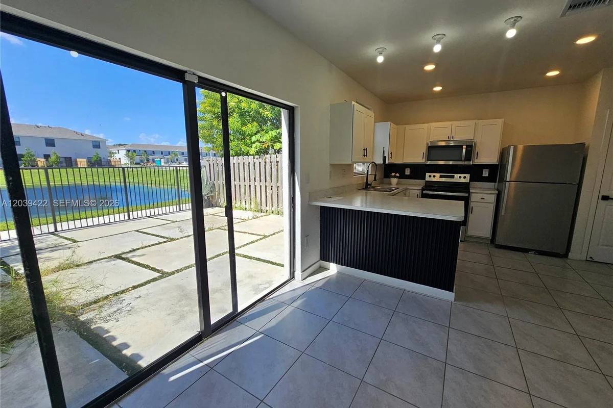 1473 NE 5th Ave, Florida City: photo 1 of 48