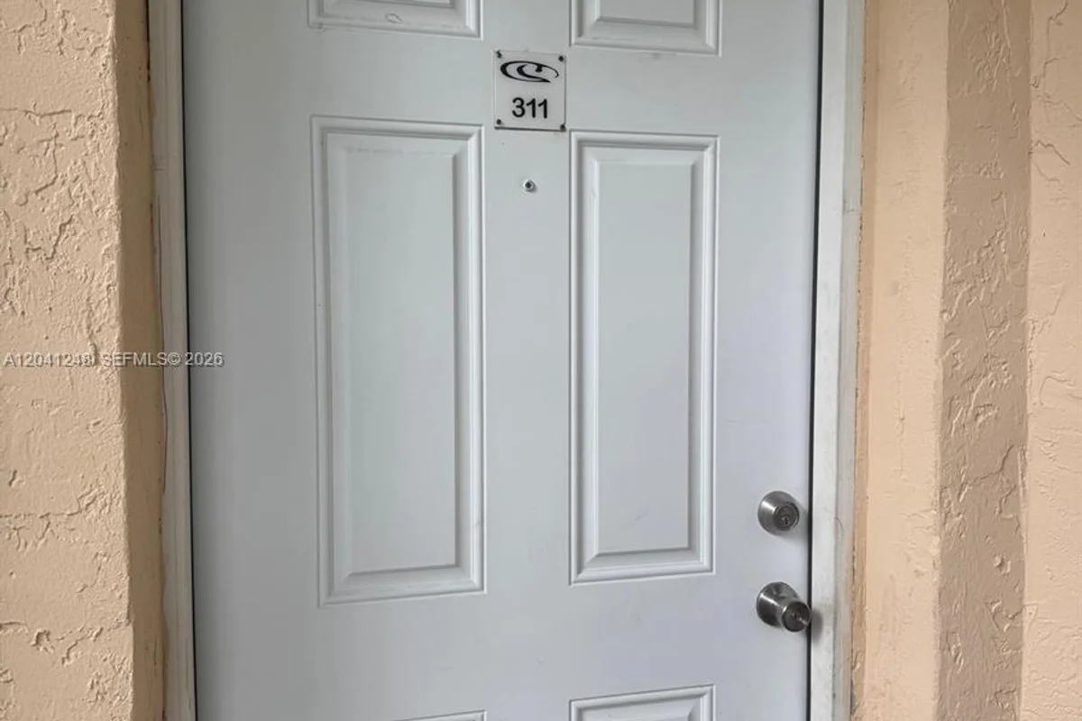 Condo in Margate: photo 1 of 16