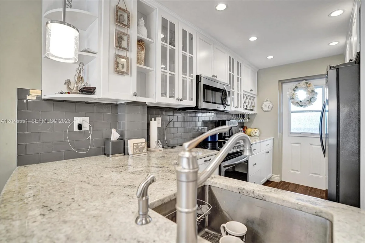 1301 E Hillsboro Blvd #307, Deerfield Beach: photo 1 of 36