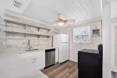 3241 Holiday Springs Blvd #108, Margate: photo 1 of 47